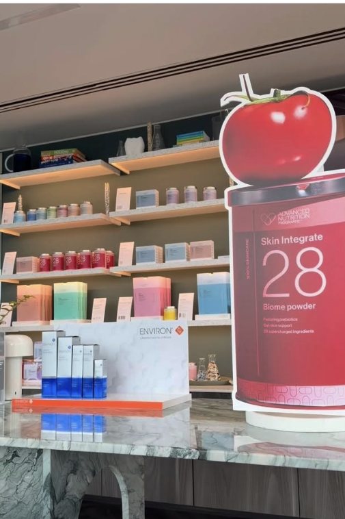 Advanced Nutrition Programme Skin Integrate 28 biome powder on display beside the Environ range